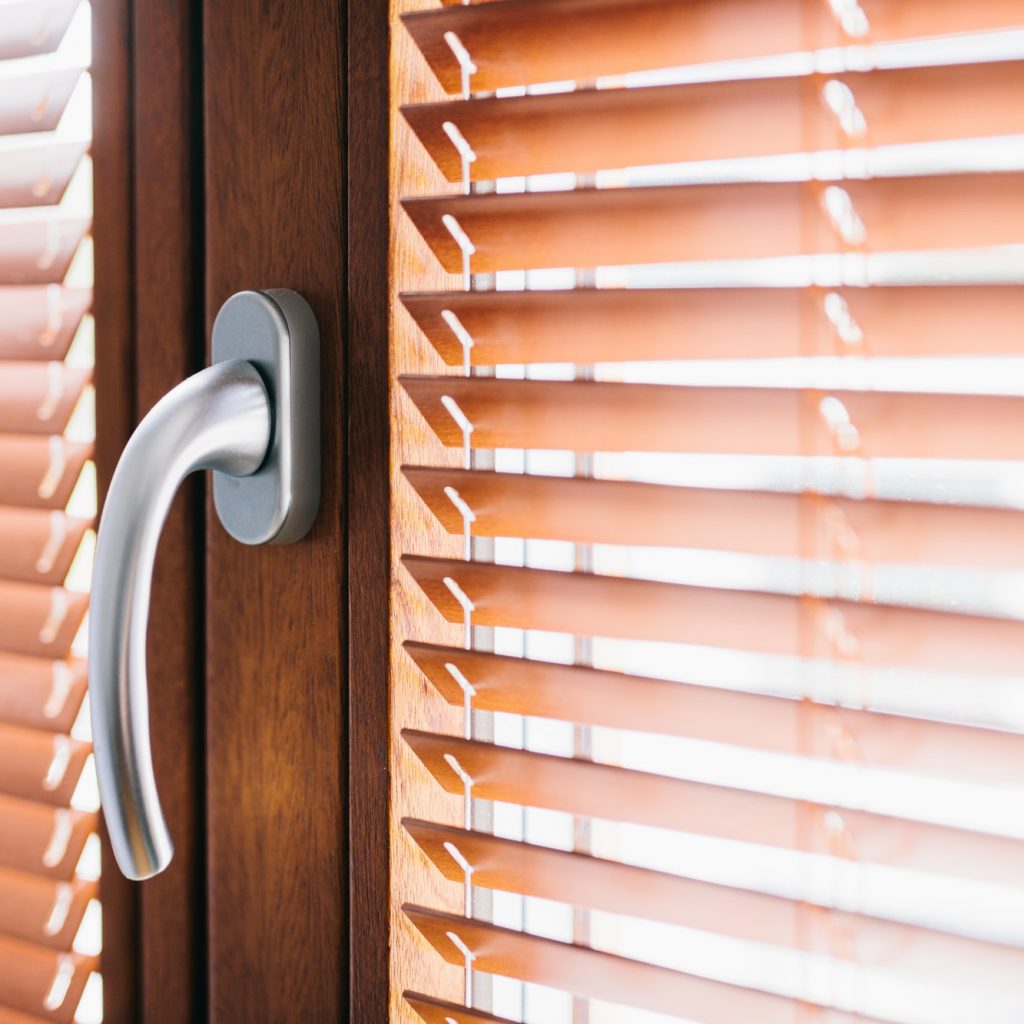 Wooden blinds on window
